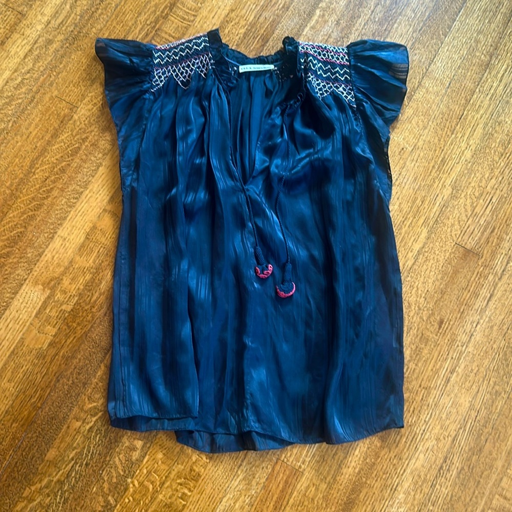 Ulla Johnson sleeveless v-neck blouse with ties.